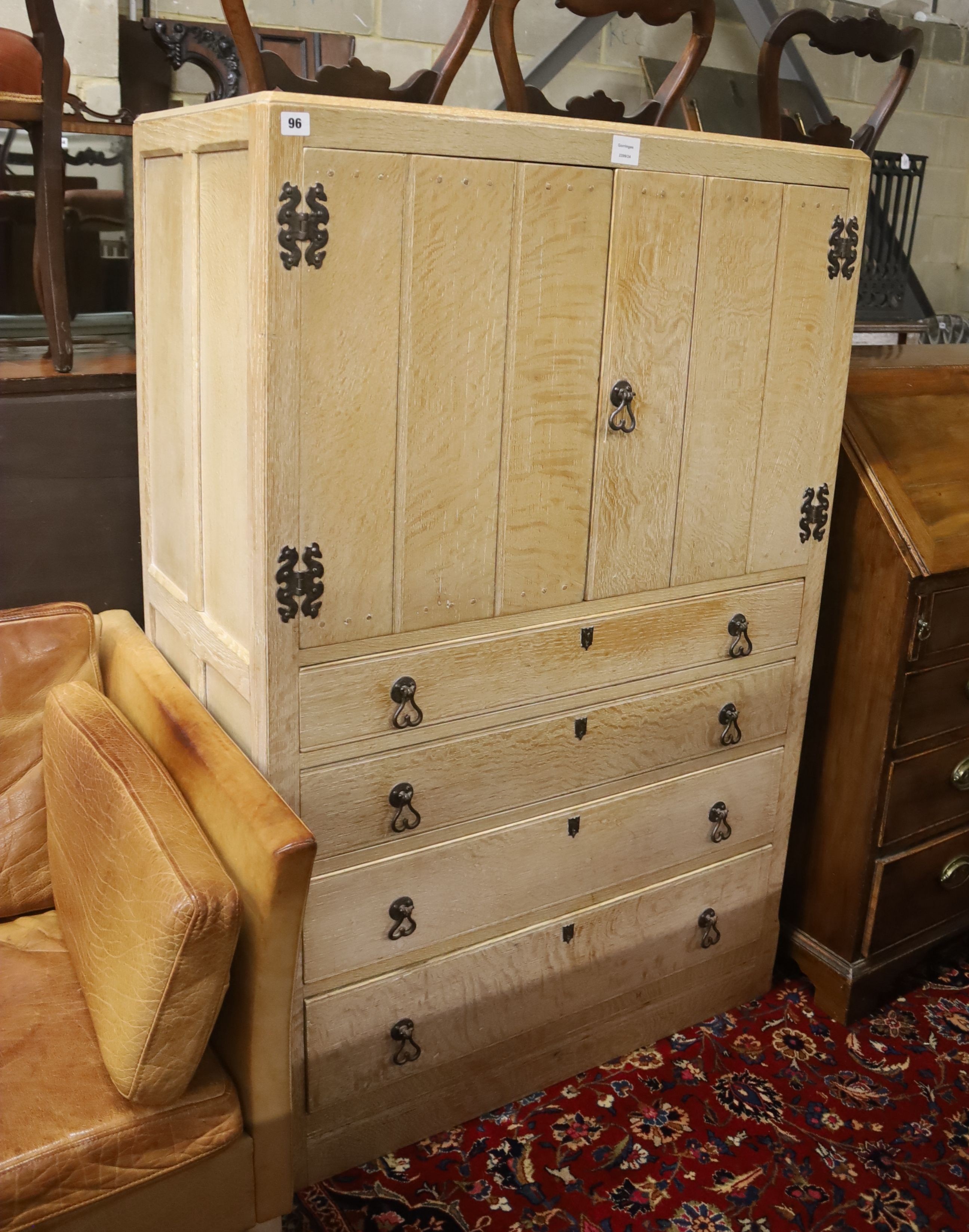 A 1930's bleached oak four drawer cabinet, width 90cm, depth 46cm, height 137cm